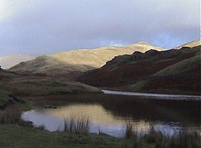 Alcock Tarn with Great Rigg in the distance