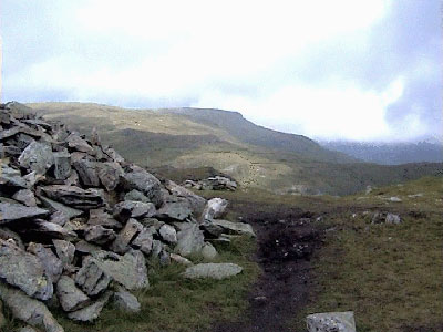 Path by the cairn with Stoney Cove Pike in the background