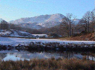 View back across Elter Water towards the Langdale Pikes