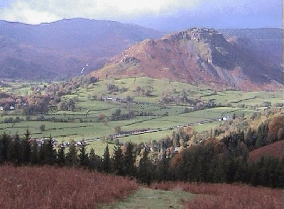 View down grassy zigzag back down to Grasmere