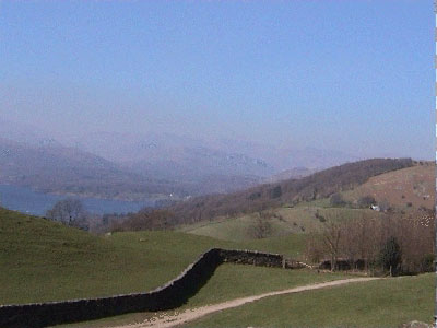 View back to the farm, Windermere and the Langdales beyond